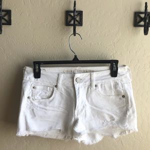 White frayed shorts